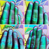 Finger Swatches Of Anneal Jewelled Multichrome Eyeshadow  angle shifts emerald-turquoise-blue-indigo-violet