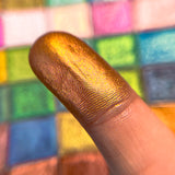Close up finger swatches on fair skin tone of Auric Deep Iridescent Multichrome