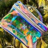 Front view of Rainbow Cosmetic Bag being held