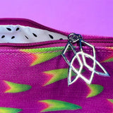 Close up of Clionadh Cosmetics logo zipper on The Dragon Fruit Cosmetic Bag