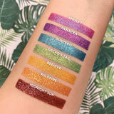 Top angled arm swatches on fair skin tone of Amulet compared to Panacea, Subzero, Gecko's Tail, Beehive, Wildfire and Midnight Sun