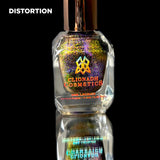 Distortion nail lacquer bottle in front of a black background.