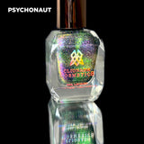 Psychonaut nail lacquer bottle in front of a black background.