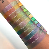 Top angled arm swatches on fair skin tone of Cobblestone, Royal Peach, Bronze Fountain, Estate, Iron Gate, Royal Pear, Hedge Maze, Wall of Ivy, Climbing Vine, Royal Plum and Statue Garden