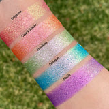 Top angled arm swatches on fair skin tone of Court Jester Glitter Vibrant Multichrome Eyeshadow shifts compared to Empress, Duchess, Diadem and Noble