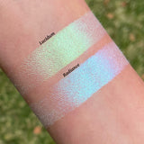 Top angled arm swatches of Lucidum Series 2 Iridescent Multichrome Eyeshadow shifts compared to Radiance