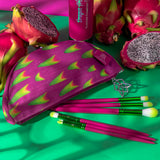 Flat lay featuring the Dragon Fruit Cosmetic Bag and 6-Piece Brush Set