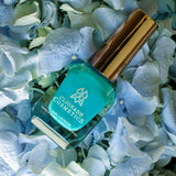 Bubbles Nail Lacquer on top of blue flowers.