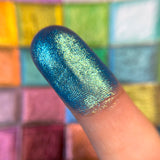 Close up finger swatches of Ciel Glitter Multichrome Eyeshadow.