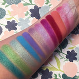 Top angled arm swatches on fair skin tone of Dreamweaver Collection including Lofty Duochrome Eyeshadow
