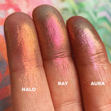 Left angled finger swatches on fair skin tone of Halo, Ray, Aura shifts