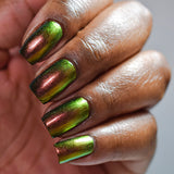 Close up of nails done with Forge Nail Lacquer on deep skin tone