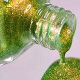 Grow Nail Lacquer pouring out of its bottle.