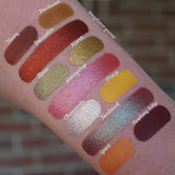 Top angled arm swatches on fair skin tone of The Harvest Moon Collection including Chamomile Duochrome Eyeshadow