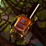 Angled view of Headless Horseman nail lacquer bottle.