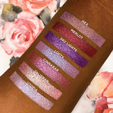 Top angled arm swatches on deep skin tone of Lofty compared to Hex, Merlot, Sky Lights, Cinnabar, Talisman and Utopia