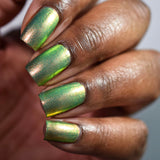 Close up of nails done with Mural Nail Lacquer on deep skin tone