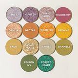 Top angled shot of The Woodlands Collection including Dahlia Duochrome Eyeshadow