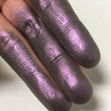 Top angled finger swatches of Permafrost Duochrome Eyeshadow