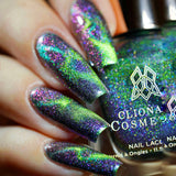 Close up of nails done with Psychonaut Nail Lacquer featuring a design to show off the magnetic effect on fair skin tone