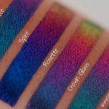 Left angled close up arm swatches on medium skin tone of Spire Jewelled Multichrome Eyeshadow shifts compared to Rosette, Crown Glass