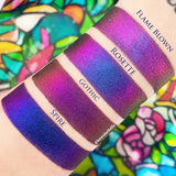 Top angled arm swatches on fair skin tone of Gothic Jewelled Multichrome Eyeshadow shifts compared to Flame-Blown, Rosette, Spire