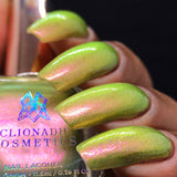 Side angled image of nails done with Royal Pear Nail Lacquer on medium skin tone