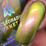 Close up of one nail done with Royal Pear Nail Lacquer on medium skin tone