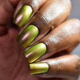 Close up of nails done with Royal Pear Nail Lacquer on deep skin tone