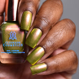 Close up of nails done with Royal Pear Nail Lacquer on deep skin tone