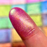 Close up finger swatch on fair skin tone of Signet Electric Multichrome Pigment