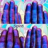 Finger swatches of Spire Jewelled Multichrome Eyeshadow angle shifts blue-violet-red-orange