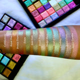 Straight angled arm swatches on medium skin tone of Cobblestone, Royal Peach, Bronze Fountain, Estate, Iron Gate, Royal Pear, Hedge Maze, Wall of Ivy, Climbing Vine, Royal Plum and Statue Garden