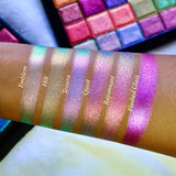 Straight angled arm swatches on medium skin tone of Quest Electric Multichrome Pigment shifts compared to Emblem, Hilt, Tessera, Rayonnant and Flashed Glass