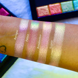 Straight on view of arm swatches on medium skin tone of Baroque Pearlescent Multichrome Eyeshadow compared to Palace, Renaissance and Sceptre