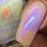 Macro shot of one nail done with UV Nail Lacquer on medium skin tone