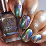 Close up of nails done with Psilocybin Nail Lacquer featuring a design to show off the magnetic effect on deep skin tone.