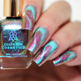 Close up of nails done with Warped nail lacquer featuring a design to show off the magnetic effect on fair skin tone.