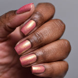 Close up shot of nails done with Wiggles Nail Lacquer on deep skin tone.