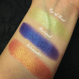 Top angled arm swatches on fair skin tone of Nocturnal Duochrome Eyeshadow compared to Eye of Newt, Salamander