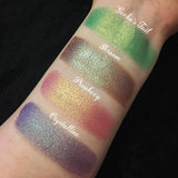 Top angled arm swatches on fair skin tone of Prophecy Duochrome Eyeshadow compared to Gecko's Tail, Shroom, Crystalline