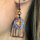 Close up of Cathedral Window Earrings being worn